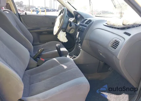 1999 Mazda Protege Es from USA, damaged, VIN JM1BJ2216X0126512